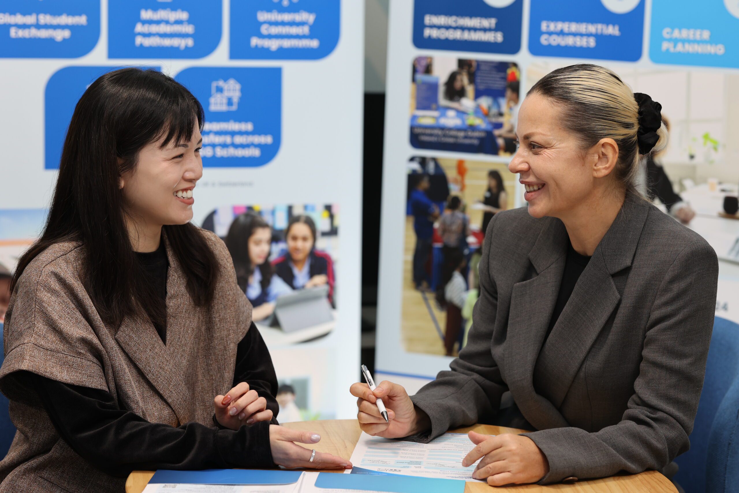 Our Friendly Admissions counsellor speaking with a parent in the admissions room about student enrolment