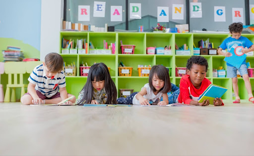 Kids studying on the floor